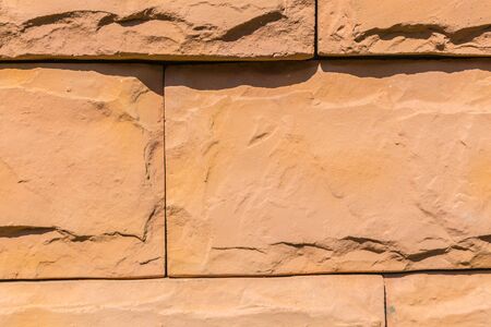 Brick wall surface in the sun.
