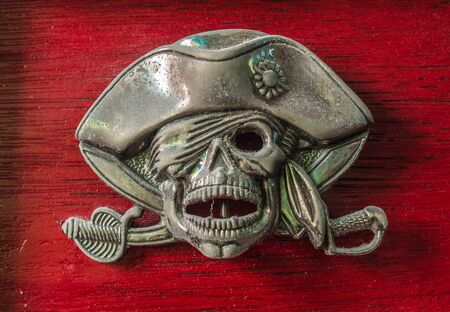 Pirate skull on a red background.の写真素材