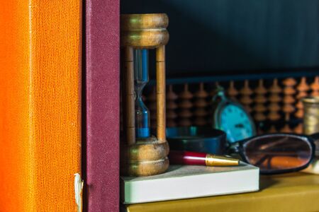 Spine stacked of books and stationery.の写真素材