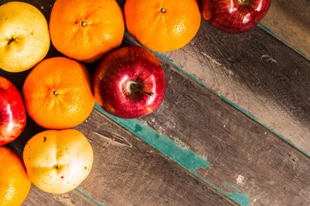Colorful variety of fruits on woodenの写真素材