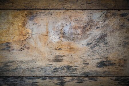 Background old wooden plate with black from mold and cracks of wood.の写真素材