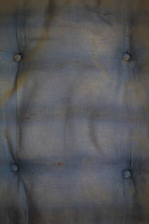 Water stains and dirt on the seat.