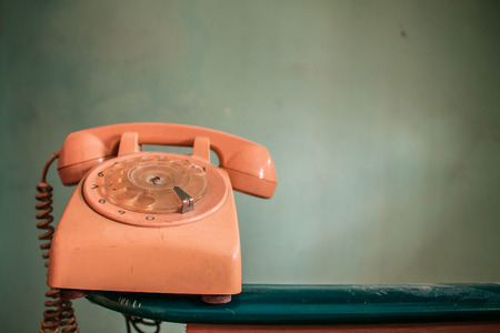 Calling on old railing against the background vintage.の写真素材