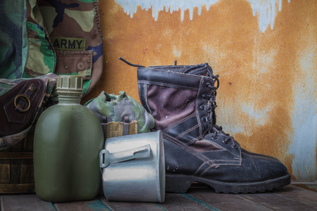 Through the use of military equipment on the wooden floor.の写真素材