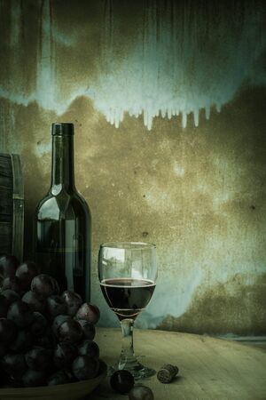 Wine glass on a wooden background old.の写真素材