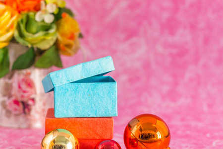 Gift boxes and balls on a pink background.の写真素材