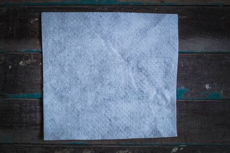 White canvases on wooden background.の写真素材