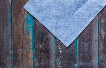 White cloth on an old wooden floor.の写真素材