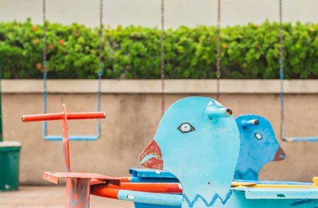 Carousel in playground within the park.の写真素材