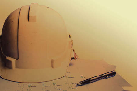 Safety helmets and drawings of old on a white background.の写真素材