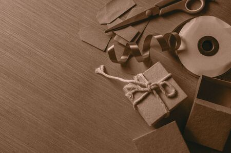 Gift box and ribbon on the wooden floor.の写真素材