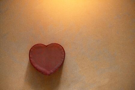 Paper Heart on old wood floors.の写真素材