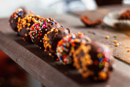 Chocolate balls of colorful on the old wooden.の写真素材