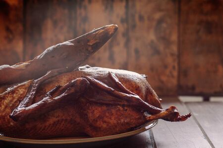 Roast duck on a hot plate in the kitchen.の写真素材