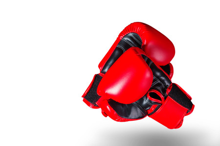 Red boxing gloves on a white background.の写真素材