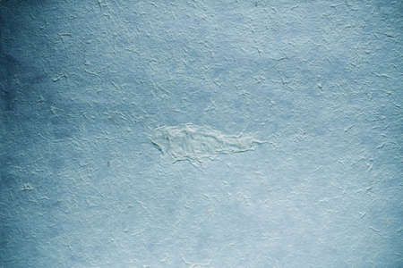 Surface of blue paper with a rough.の写真素材