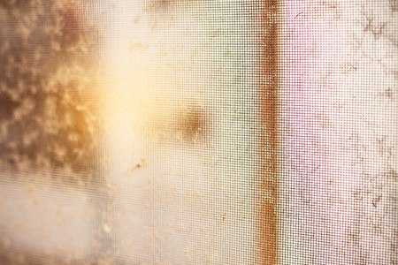 Frame old and dusty windows of the house.の写真素材