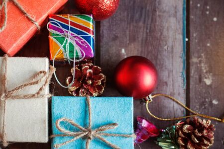 Gift boxes and balls on the old wooden floor.