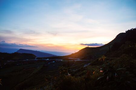 Mountain landscape with the sky at sunset.の写真素材