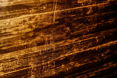 Surface of cracks on the old glass.の写真素材