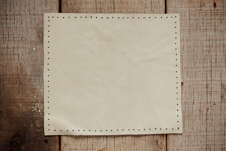 White leather on the old wooden floor.の写真素材