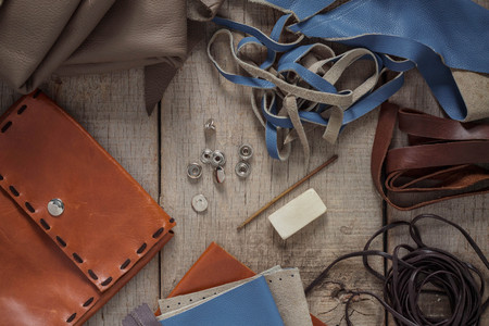 leather repairing equipment on the table.