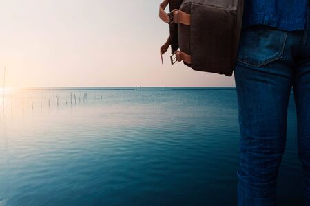 Tourist women with the blue sea.の写真素材