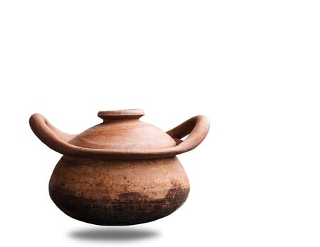 Old clay pot on a white background.の写真素材