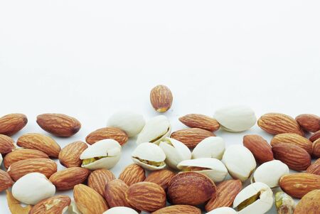 Many almonds on a white background.の写真素材
