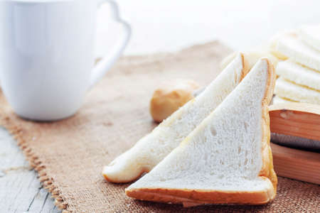 Bread on the table and cup of coffee.の写真素材