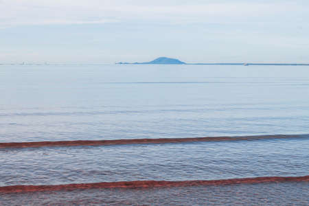 Waves on the sea and blue sky.の写真素材