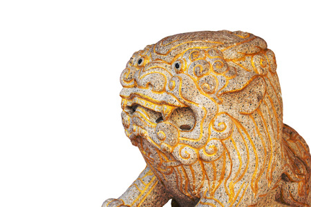 The old lion statue on white background.の写真素材