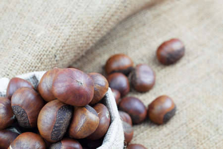Roasted chestnuts in a bag of sackcloth.