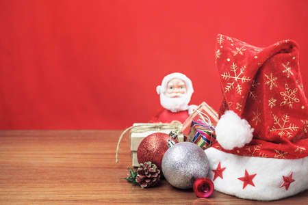 Christmas decorations and gift boxes on wooden.の写真素材