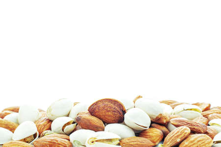Many almonds on a white background.の写真素材