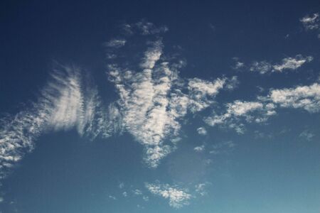 Clouds with beautiful of shapes at the blue sky.の写真素材