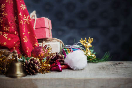 Decoration and gift box on wooden floor at night.の写真素材