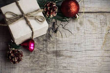 Gift box and ball on the old wooden floor.の写真素材