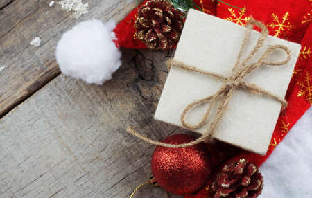 gift box and hat on wooden floor.の写真素材