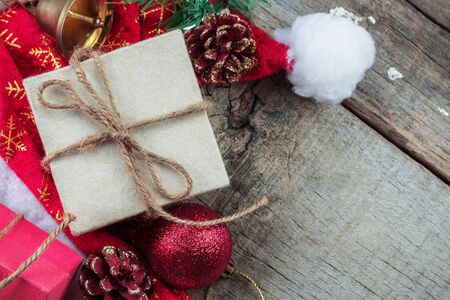 Gift box and christmas decoration on wooden floor.の写真素材