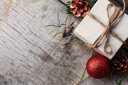 Gift box and ball on the old wooden floor.の写真素材