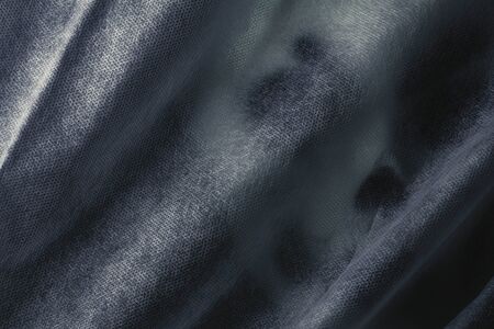 Hooded on a ghostly mask with a background.の写真素材