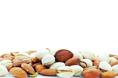Almond mixed with a white background.の写真素材