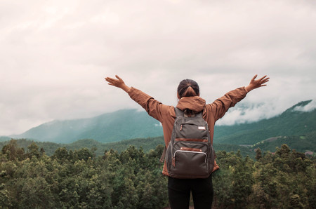 Girl with traveling and nature on the mountain.の写真素材