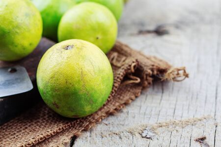 Lemon and knife on a sack.の写真素材