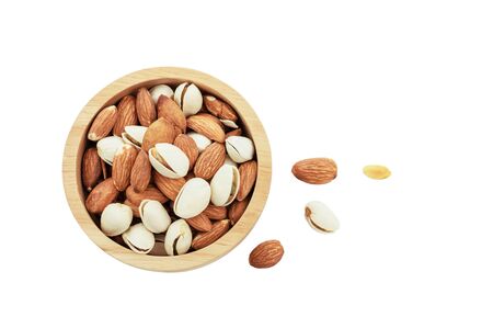 Almond in bowl on a white background.の写真素材