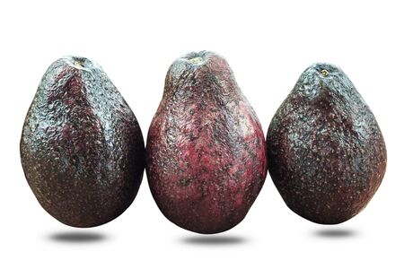 black avocado is rotten on a white background.の写真素材