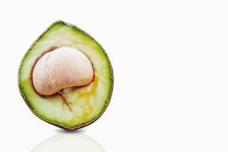 Half cut avocado on a white background.の写真素材