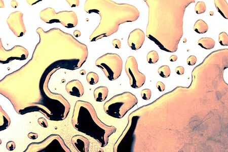 Water droplets on tile floor with shadows on the background.の写真素材