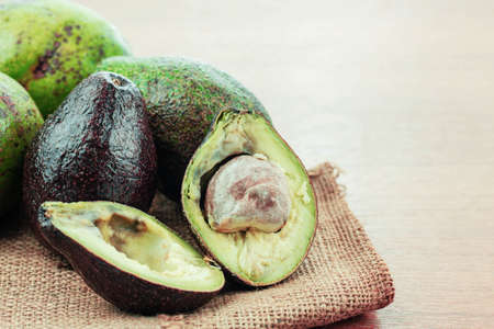 Ripe fruit of avocado on sack.の写真素材